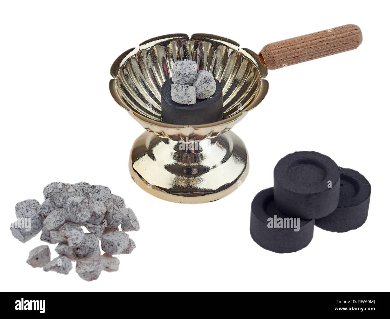 A simple Romanian orthodox censer or incense burner, with incense bits