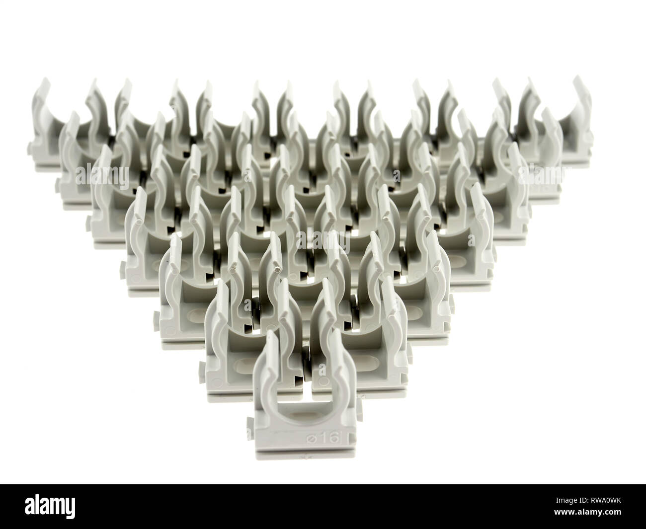 Plastic clamps for electrical tubing, isolated on white Stock Photo Alamy