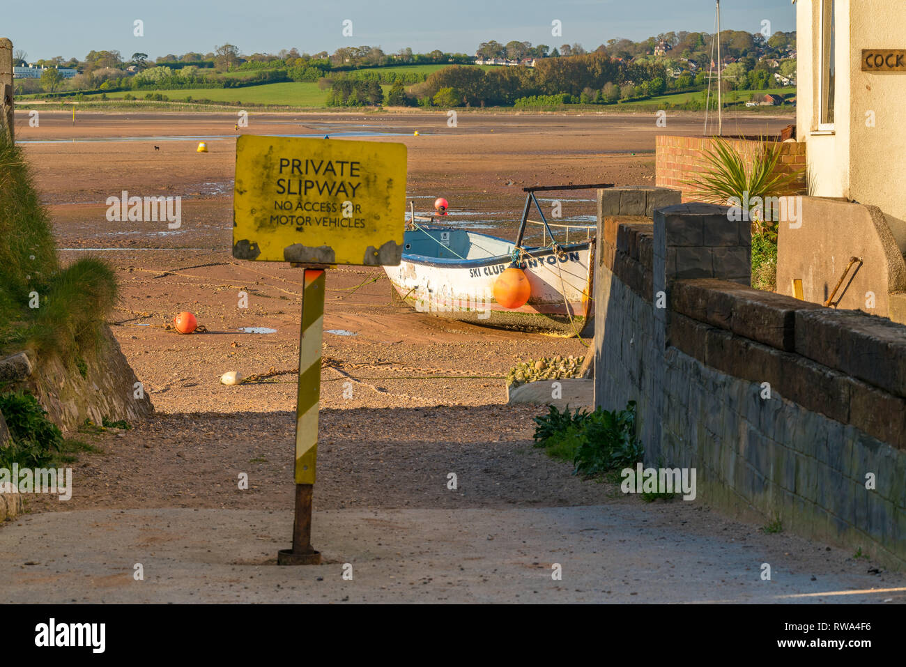 Emouth, Devon, England, UK - April 18, 2017: Sign Private slipway with a  boat in the background Stock Photo