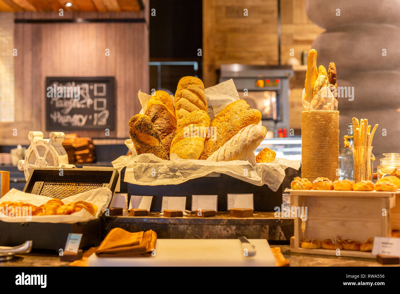 Modern Bread Counter With Large Fresh Bakery Products Stock Photo