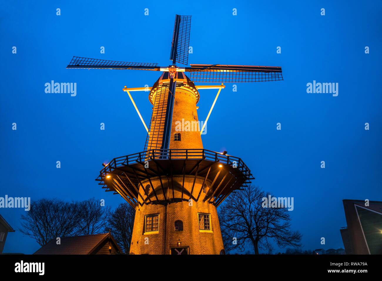 Windmill De Hoop at dusk, Hellevoetsluis, South Holland, Netherlands Stock Photo