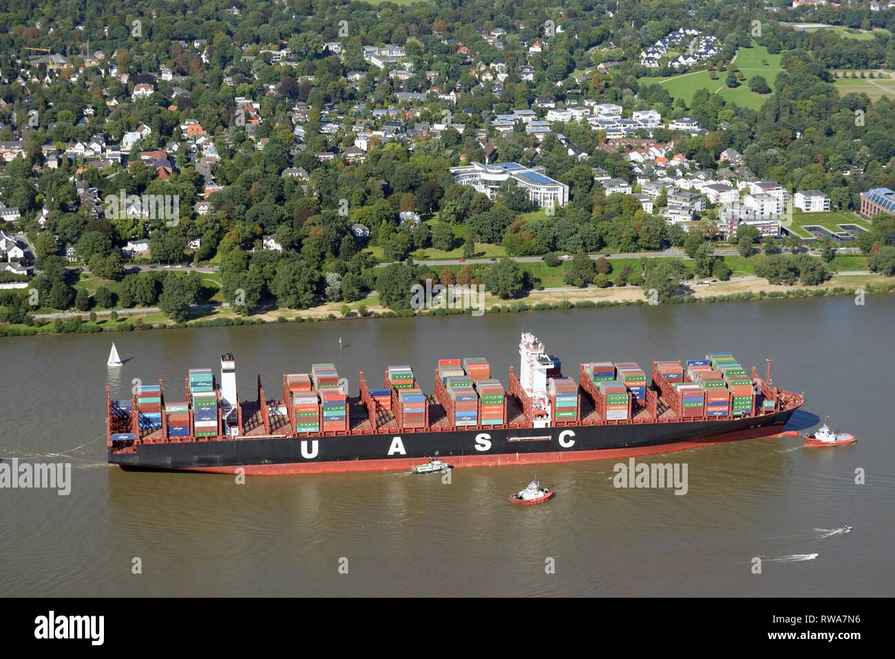 Aerial view, Loaded container ship UASC Al Nefud on the Elbe river in front of the Tribunal for the Law of the Sea Stock Photo