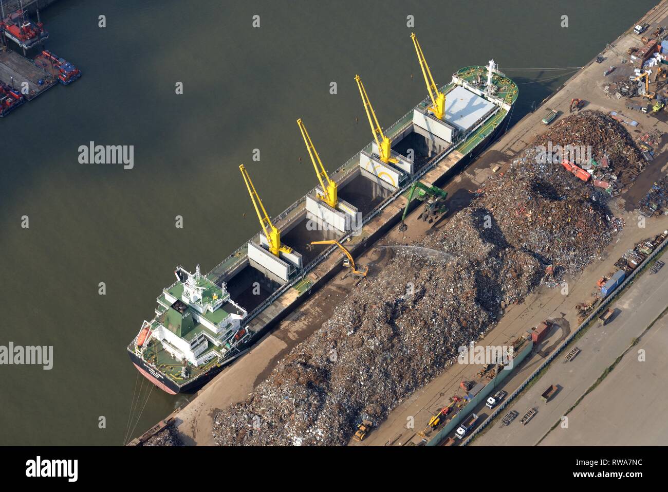 Aerial view, Scrap loading on cargo ship, Elbe, Hamburg, Germany Stock Photo