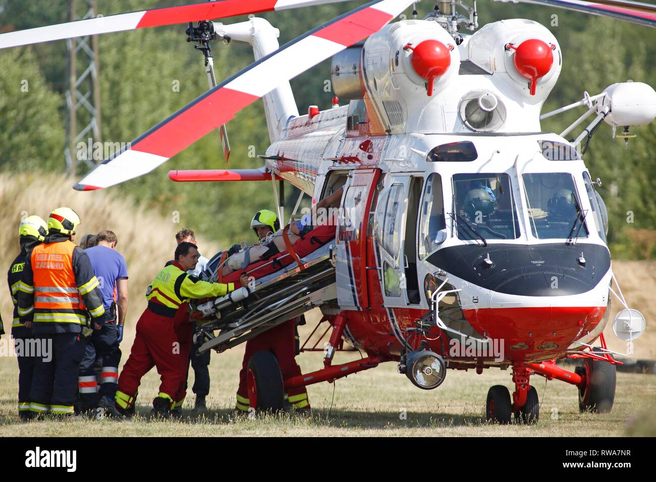 Injured person is loaded into rescue helicopter by rescue forces, air rescue service, Czech Republic Stock Photo