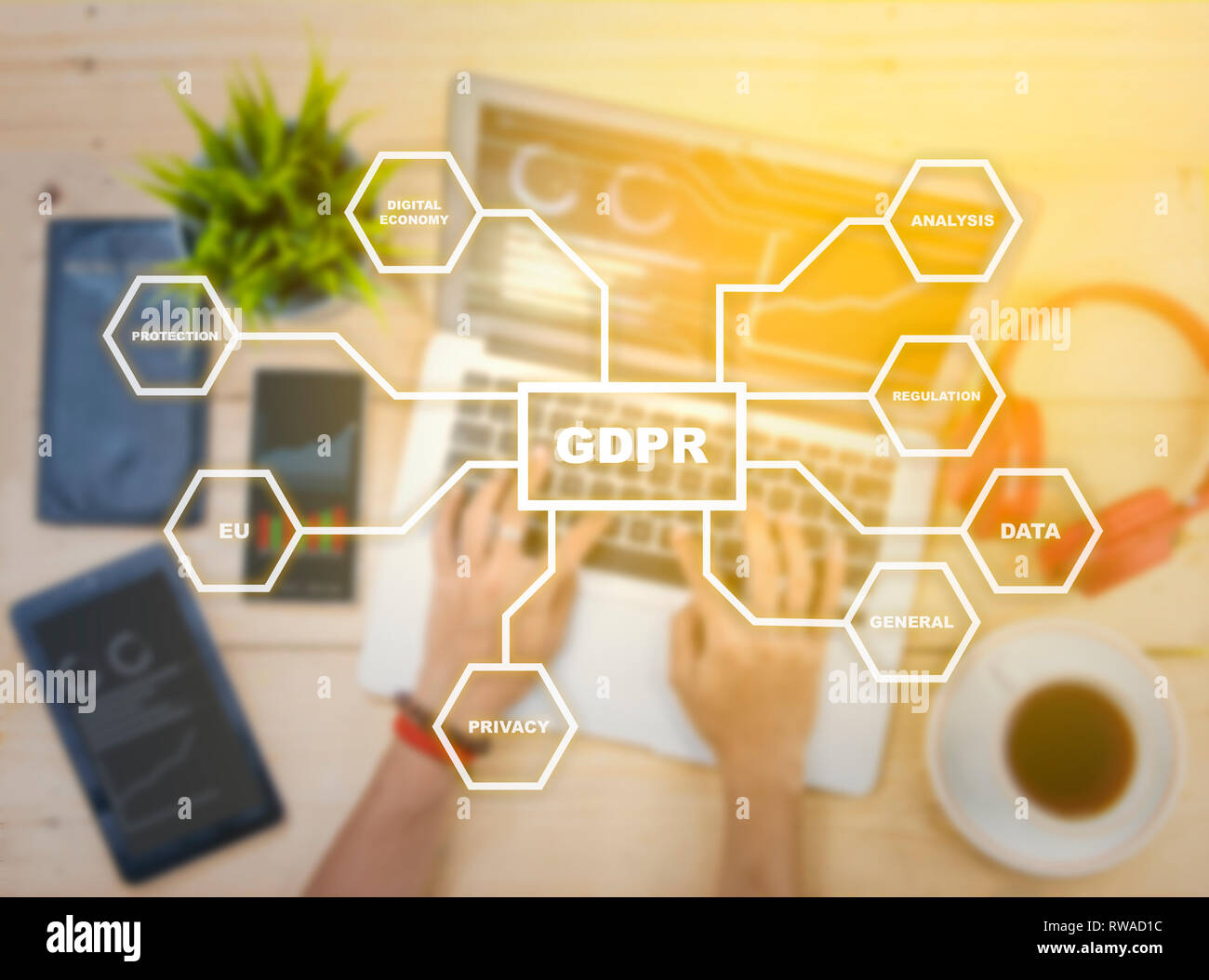 GDPR with protection structure with businessman working using laptop and digital gadget on the desk background. Cyber security and privacy. General Da Stock Photo