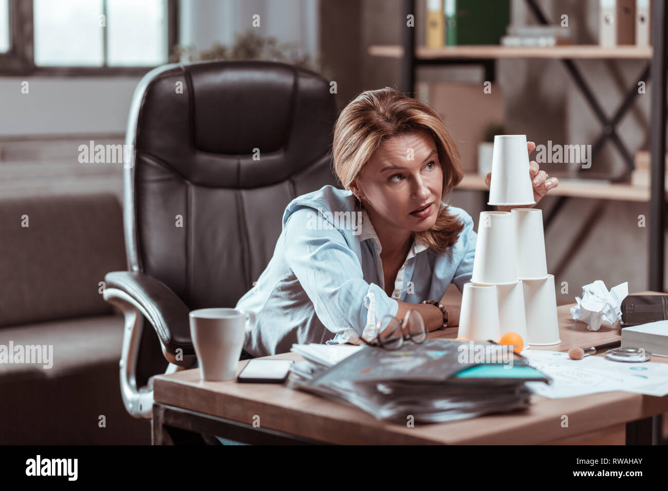 Blonde lawyer having no inspiration feeling stressed and depressed Stock Photo