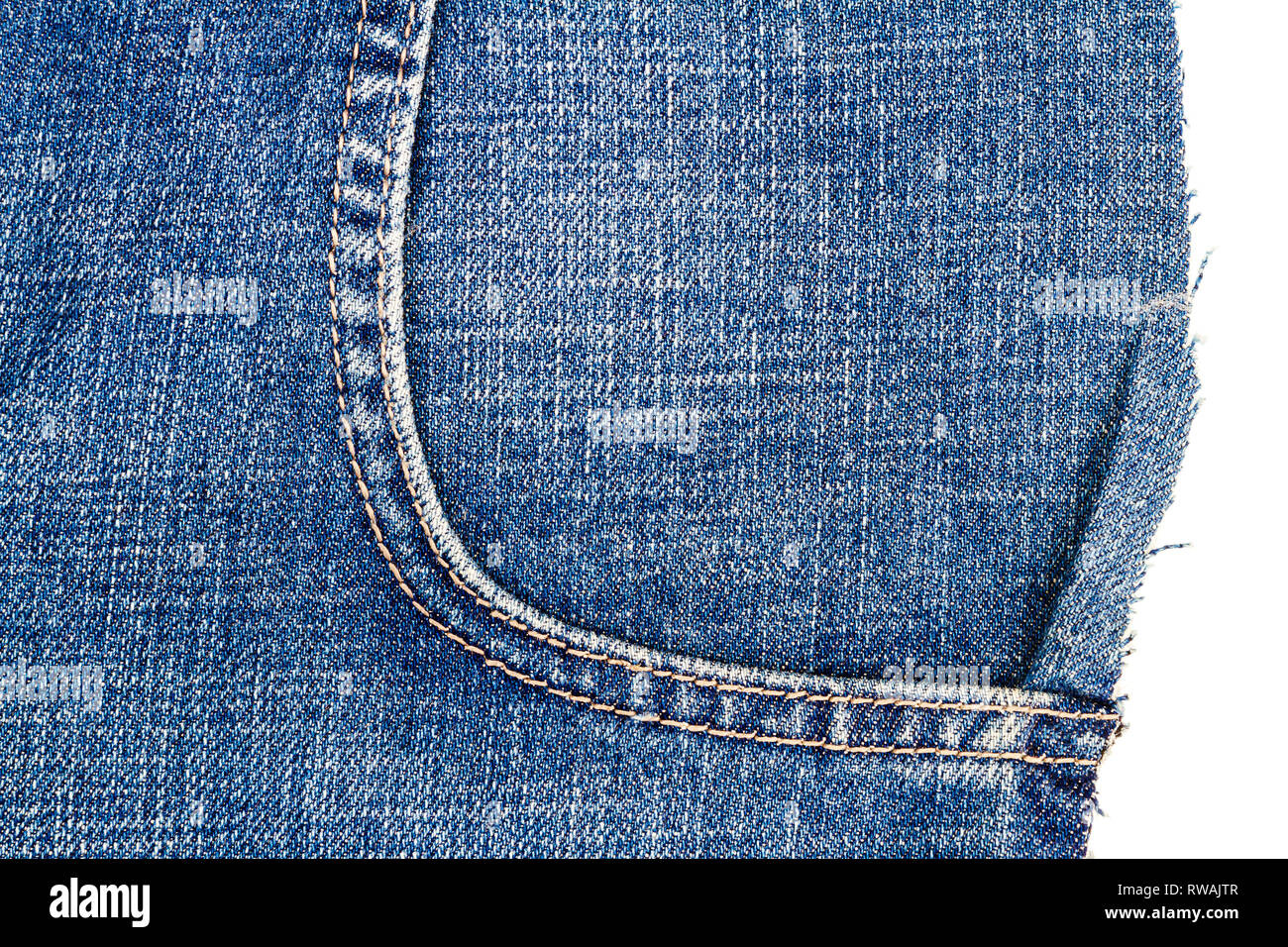 Piece of blue jeans fabric isolated on white background. Rough uneven