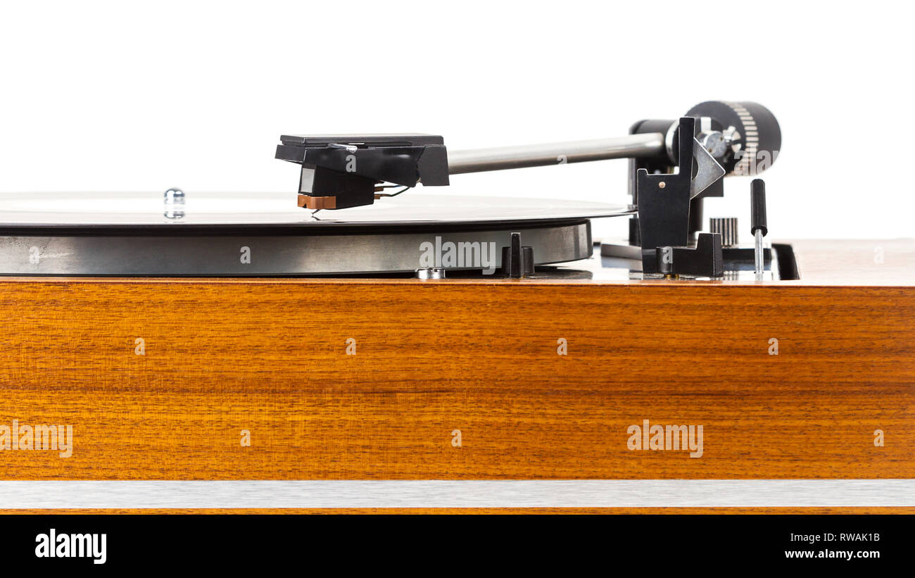 Close up of vintage turntable vinyl record player isolated on white ...