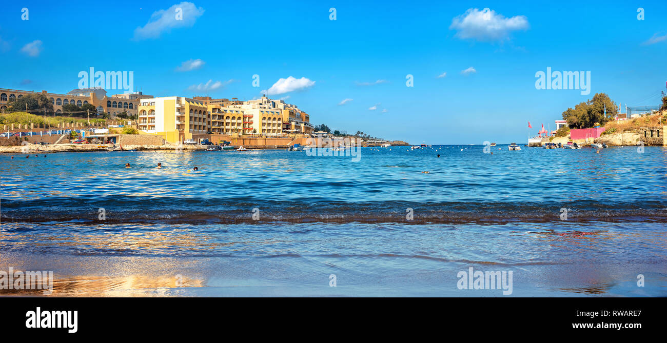 Panoramic view from beach of St. Georges bay. Malta Stock Photo
