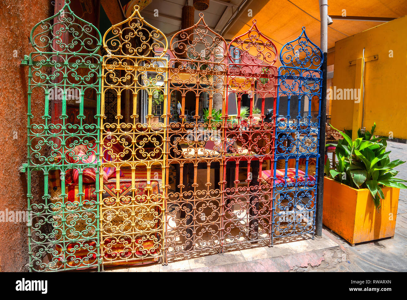 Ornamental colorful inside fence in street cafe on market at Medina quarter. Marrakesh, Morocco, North Africa Stock Photo