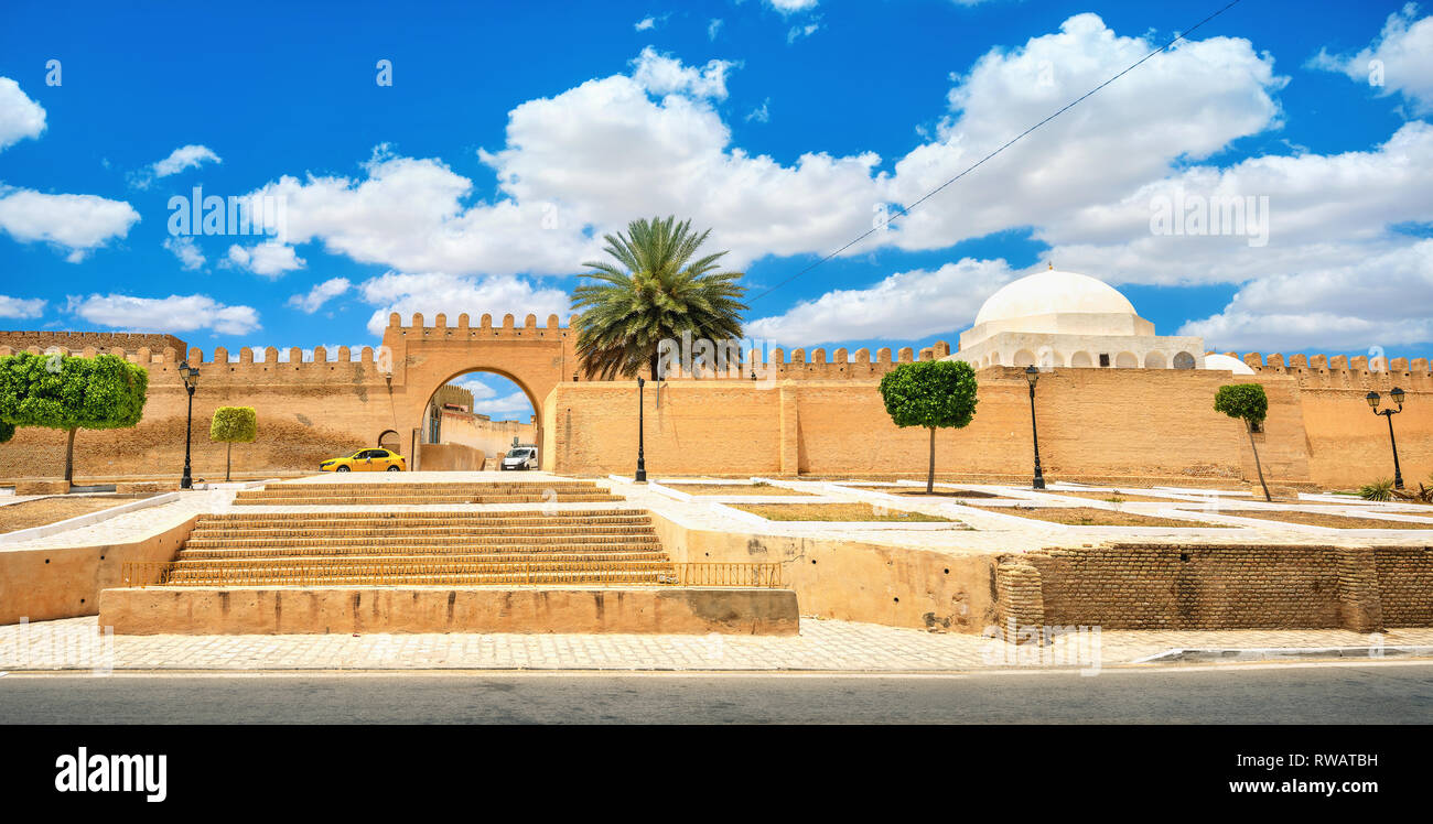 Ancient walls and entrance gate of Great Mosque in Kairouan city. Tunisia, North Africa Stock Photo