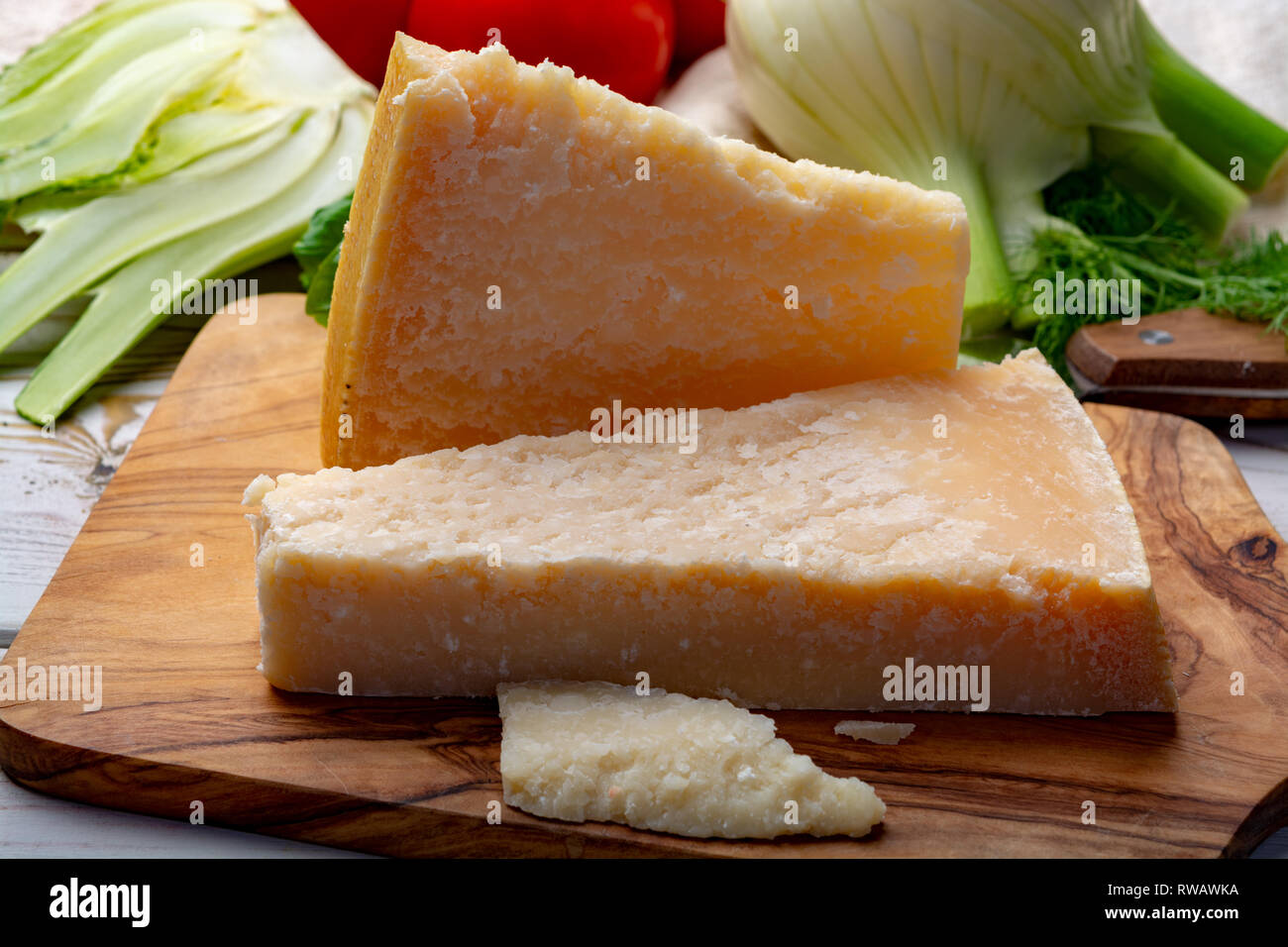 Original italian cheese, aged Parmesan cow milk cheese, pieces of