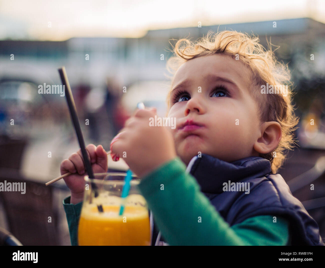 Boy drinking orange juice hires stock photography and images Alamy