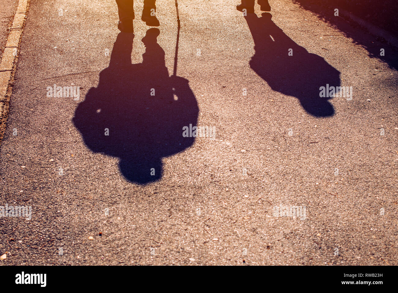 Two people walking on pavement hi-res stock photography and images - Alamy