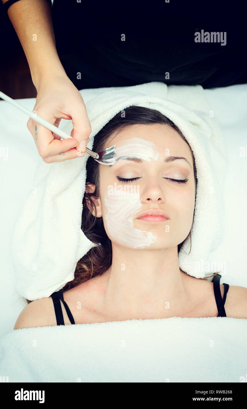 Woman and facial cream hi-res stock photography and images - Alamy