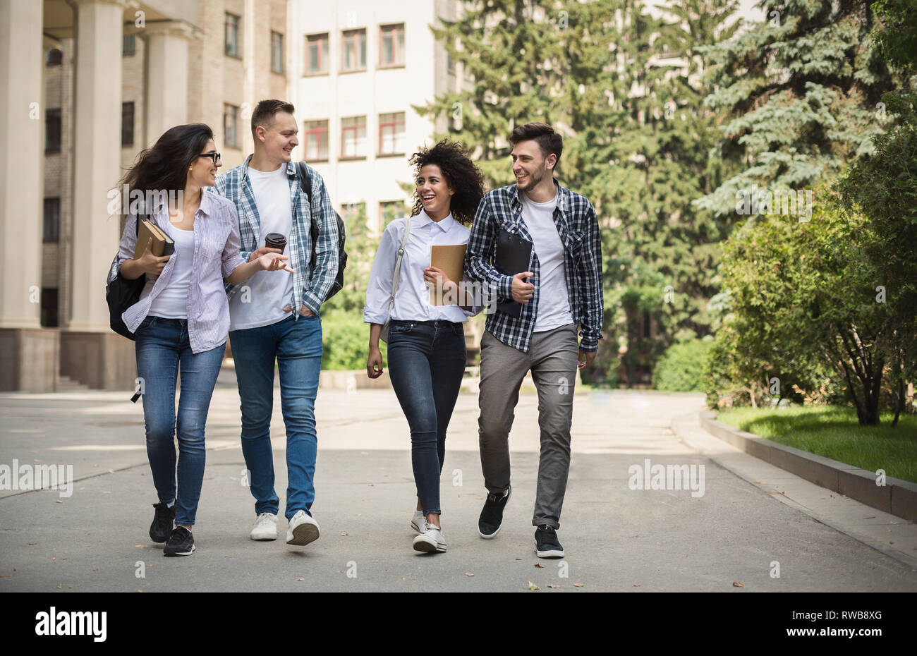 Multiethnic group of students near collage Stock Photo