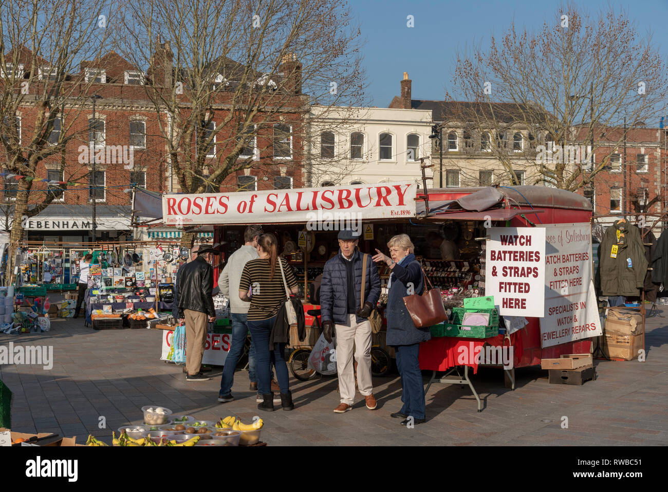 Salisbury, Wiltshire, England, UK. March 2019.  Stalls and customers on market day on the Market Place in the city centre Stock Photo