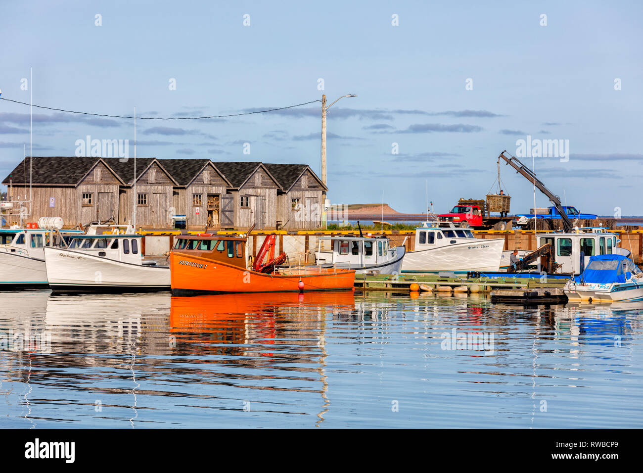 Fishing boats tied up at wharf, Beach Point, Prince Edward Island, Canada Stock Photo