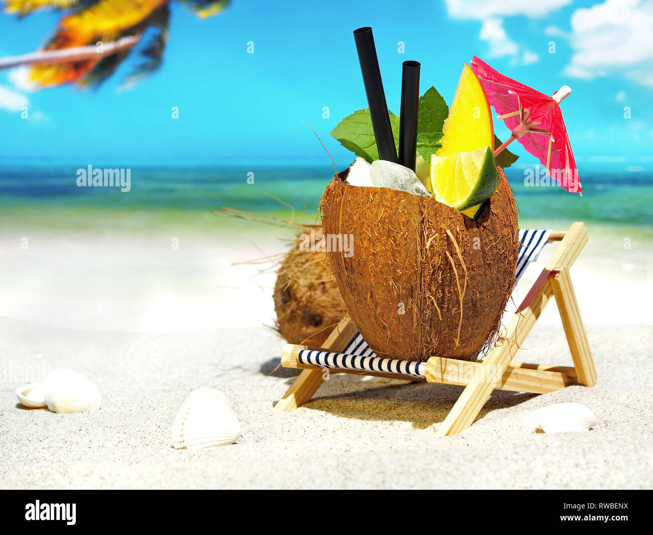 Coconut Cocktail on tropical Beach Stock Photo Alamy