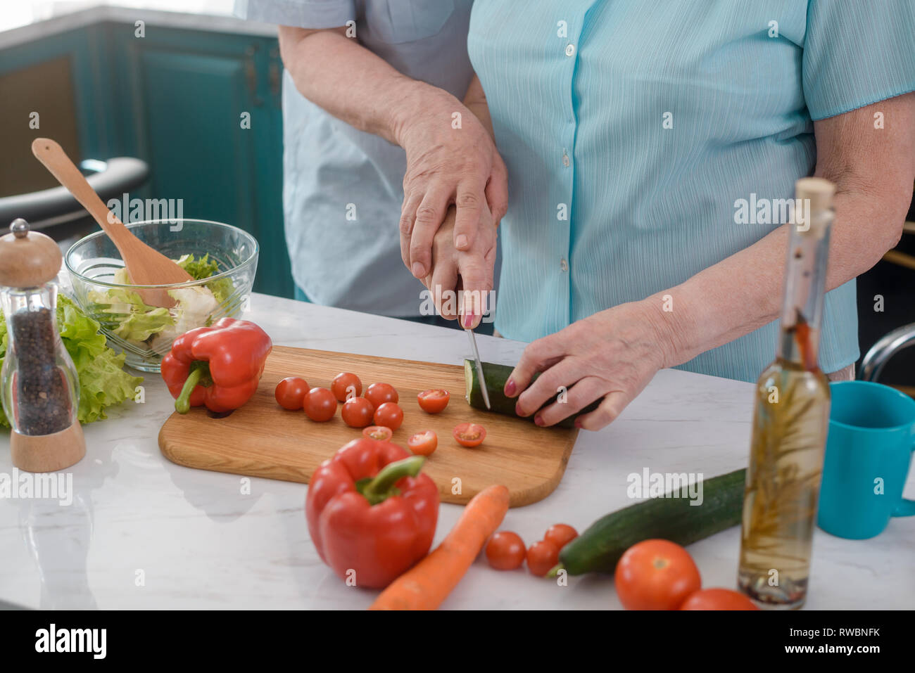 Old couple cooking hi-res stock photography and images - Alamy