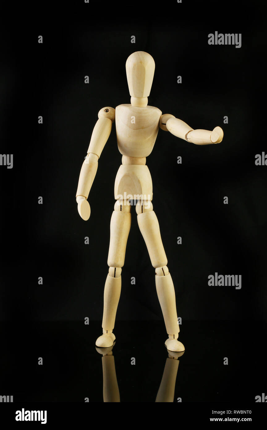 Artist's wooden manikin isolated against black Stock Photo Alamy