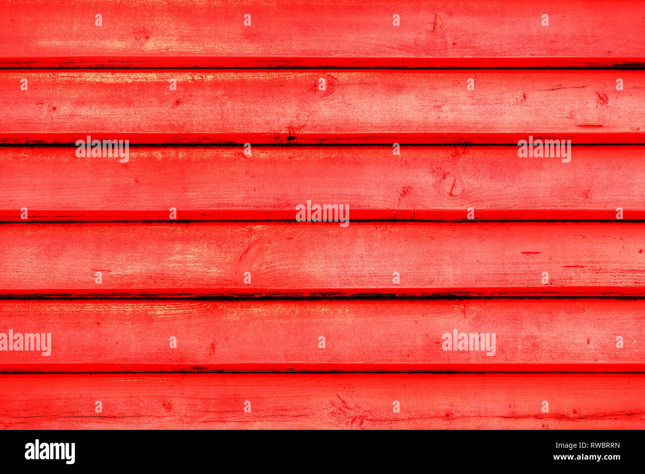 Red vintage wooden boards in overlap cladding pattern, front view as copy  space or graphic design background Stock Photo - Alamy