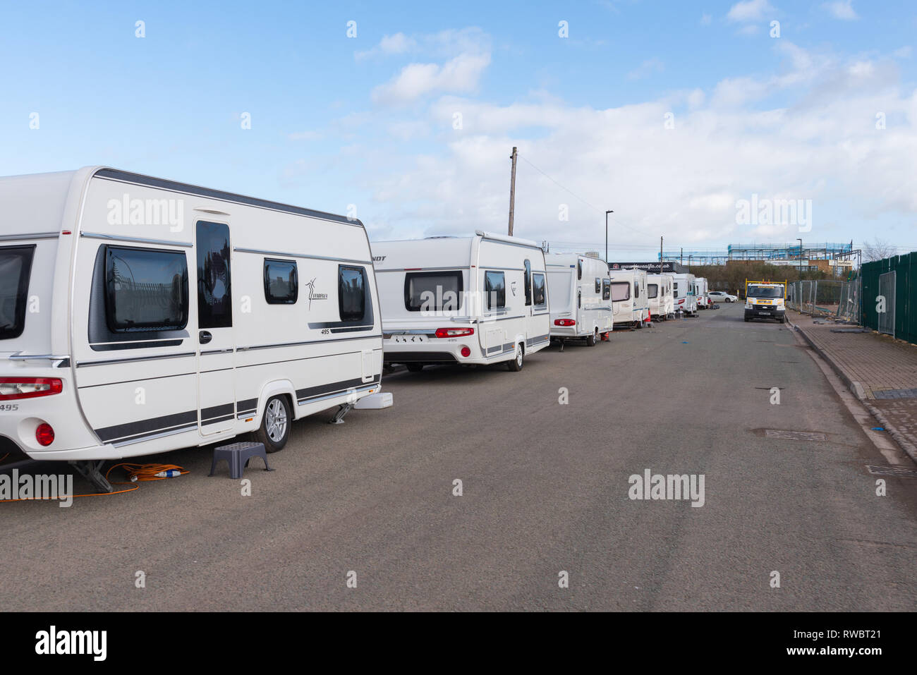 A line of travellers' caravan parked on a road in Ladywood, an inner city district of Birmingham Stock Photo