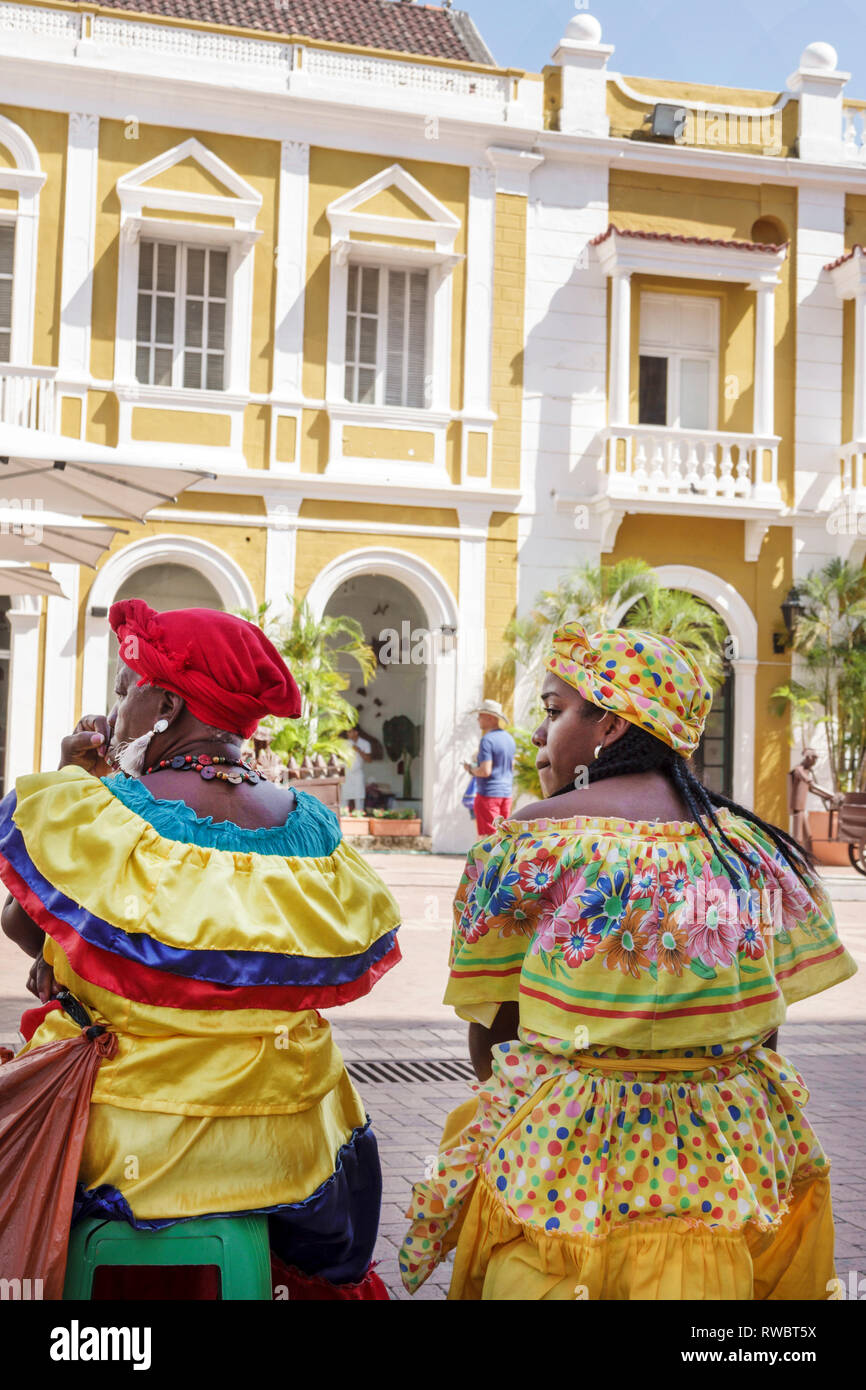 Cartagena Colombia,Plaza San Pedro Claver,Black Afro Caribbean Palenqueras,woman female women,fruit vendor,traditional costume,cultural heritage symbo Stock Photo