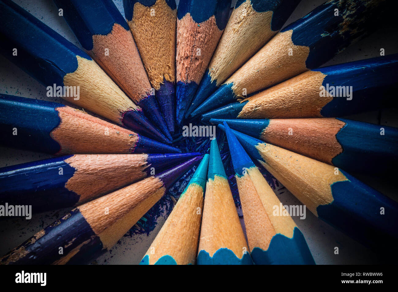 A blue pencils lying on a white background. An creativity. A good idea. Be creative Stock Photo