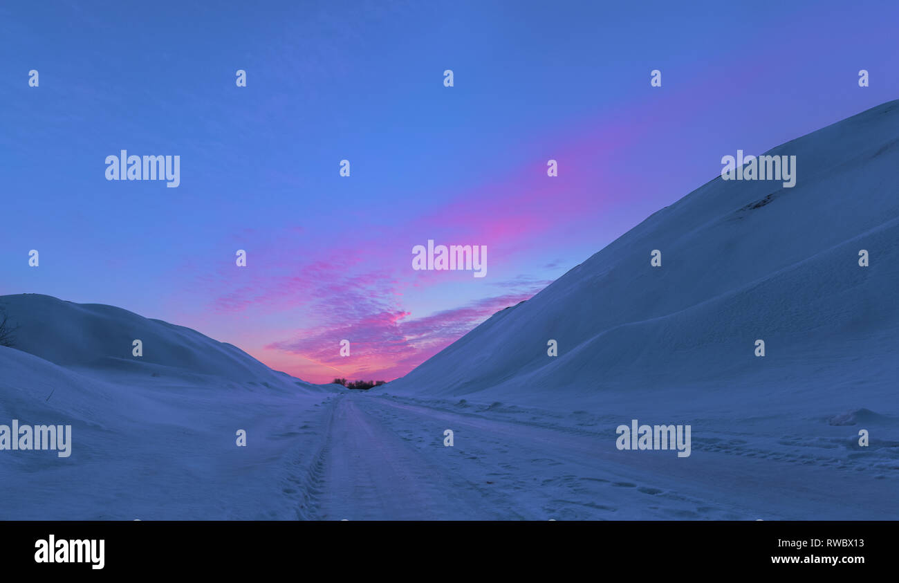 Beautiful Snowdrifts on sunset background. Winter sunset landscape in Krivoy Rog, Ukraine Stock Photo