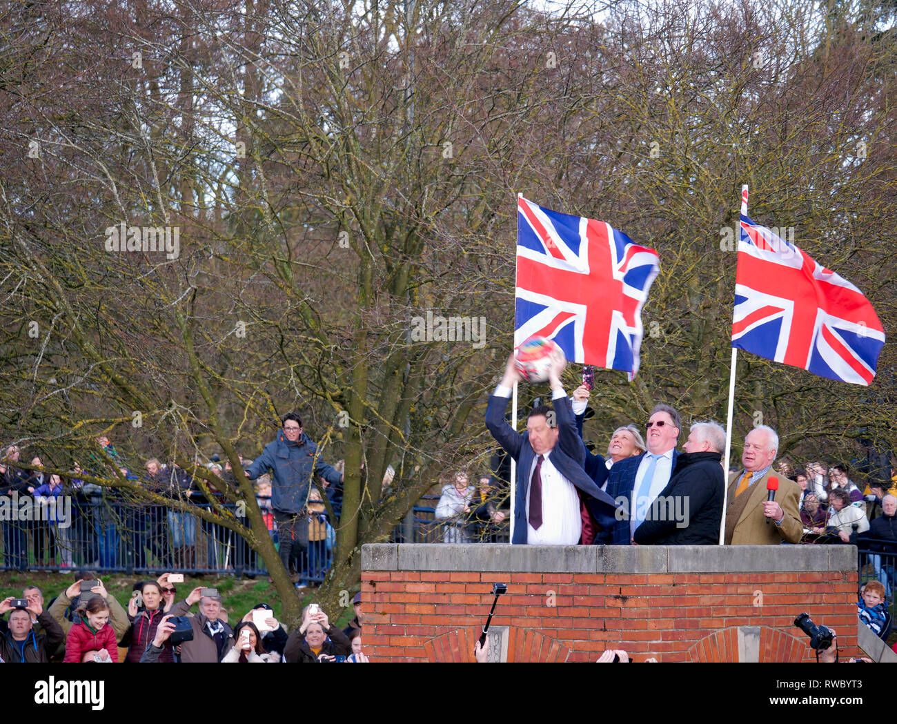 Ashbourne Derbyshire, UK. 5th Mar, 2019. Ashbourne Royal Shrovetide Football match on Shrove Tuesday. Ye Olde & Ancient Medieval hugball game is the forerunner to football. It's played between two teams, the Up'Ards & Down'Ards separated by the Henmore Brook river. The goals are 3 miles apart at Sturston Mill & Clifton Mill. Charles Cotton's poem Burlesque upon the Great Frost, dating from 1683, mentions this game at Ashbourne. He was the cousin of Aston Cockayne Baronet of Ashbourne, Derbyshire. Credit: Doug Blane/Alamy Live News Stock Photo