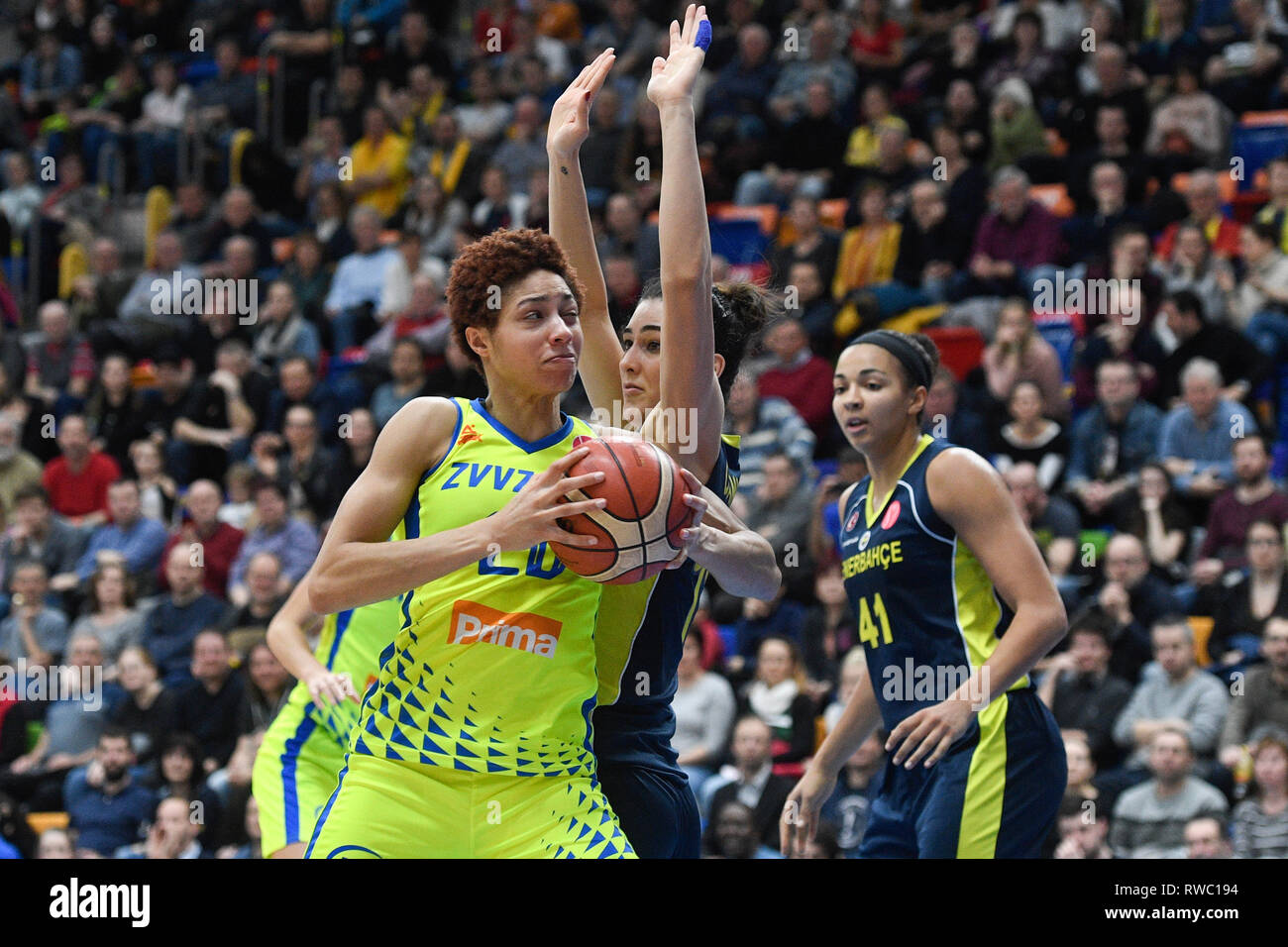 The Czech team USK Prague beat Fenerbahce Istanbul 76-54 in a women's basketball European League quarterfinal match in Prague, Czech Republic, March 5, 2019. L-R ISABELLE HARRIS of USK, TUGCE CANITEZ of Fenerbahce in action . (CTK Photo/Michal Kamaryt) Stock Photo