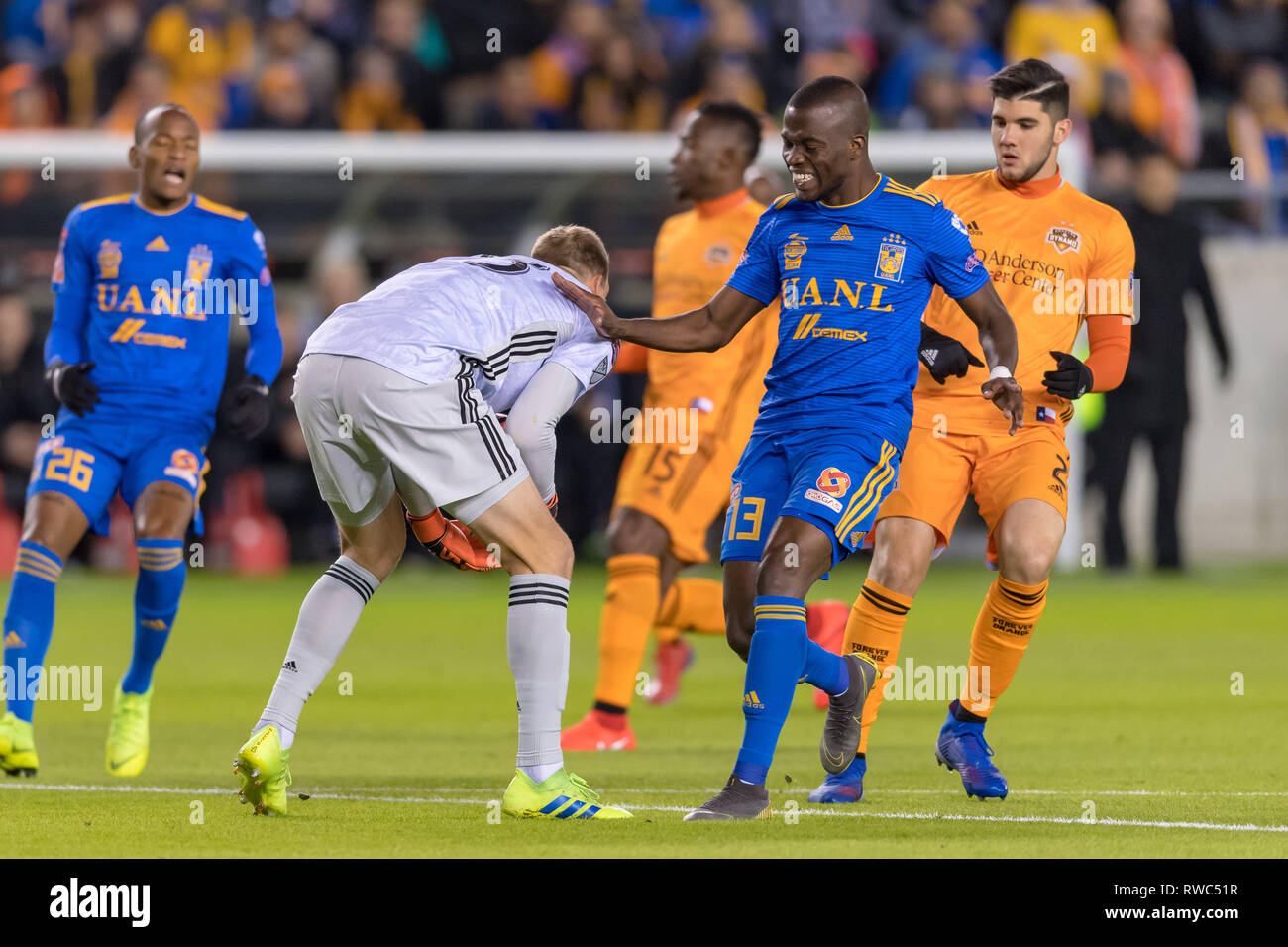 Houston, Texas, USA. 05th Mar, 2019. February 26, 2019: Houston Dynamo goalkeeper Joe Willis (23) saves the ball that was sent for UANL Tigres forward Enner Valencia (13) during the CONCACAF Champions League quarter finals game 18 leg 1 between UANL Tigres and Houston Dynamo at BBVA Compass Stadium in Houston, Texas The score at the half 0-0 © Maria Lysaker/CSM. Credit: Cal Sport Media/Alamy Live News Stock Photo