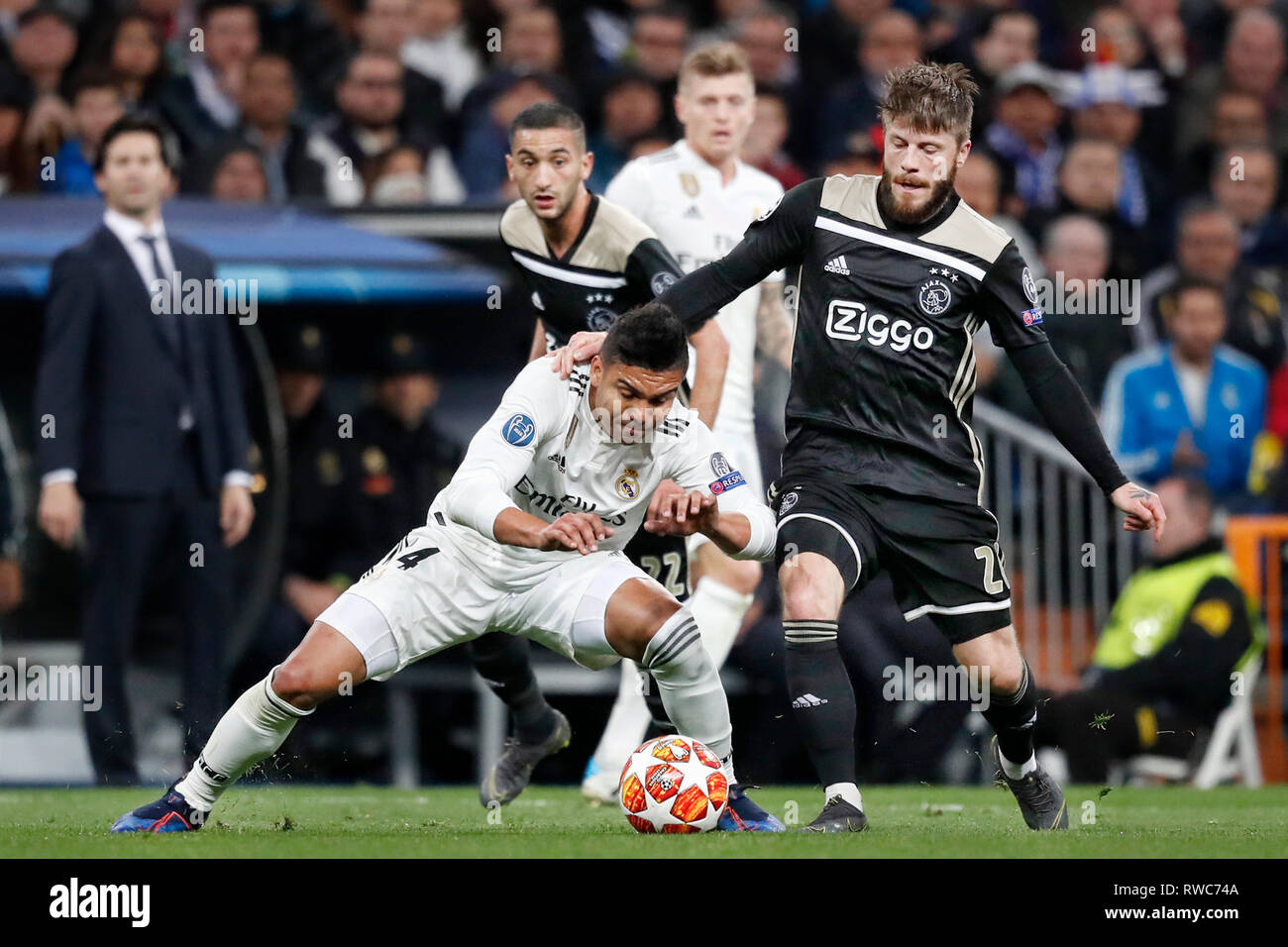 MADRID, 05-03-2019, Stadium Bernabeu, season 2018 / 2019 , Champions League  1/8th round second leg. Real Madrid player Casemiro (L) and Ajax player  Lasse Schone (R) during the game Real Madrid - Ajax (1-4 Stock Photo - Alamy