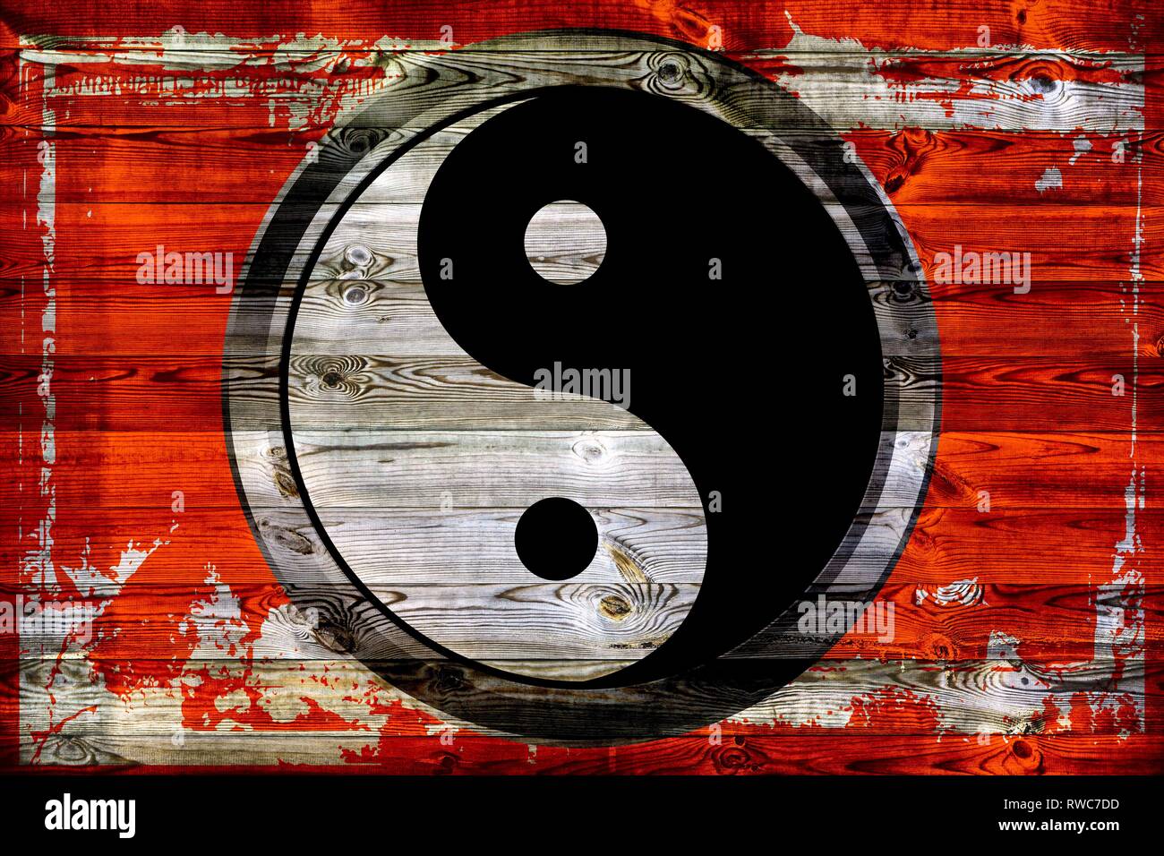 Deutschland. 25th July, 2014. The Yin and Yang symbol on a wood background with damaged paint, orange. Chinese Taijitu stands for 'symbol of the very greatest/highest'. It is a sign used in Chinese Taoism and New Confucianism (Chinese tu, symbol or diagram) for the Taiji ('very great outsider') conceived as the origin of the world. | usage worldwide Credit: dpa/Alamy Live News Stock Photo