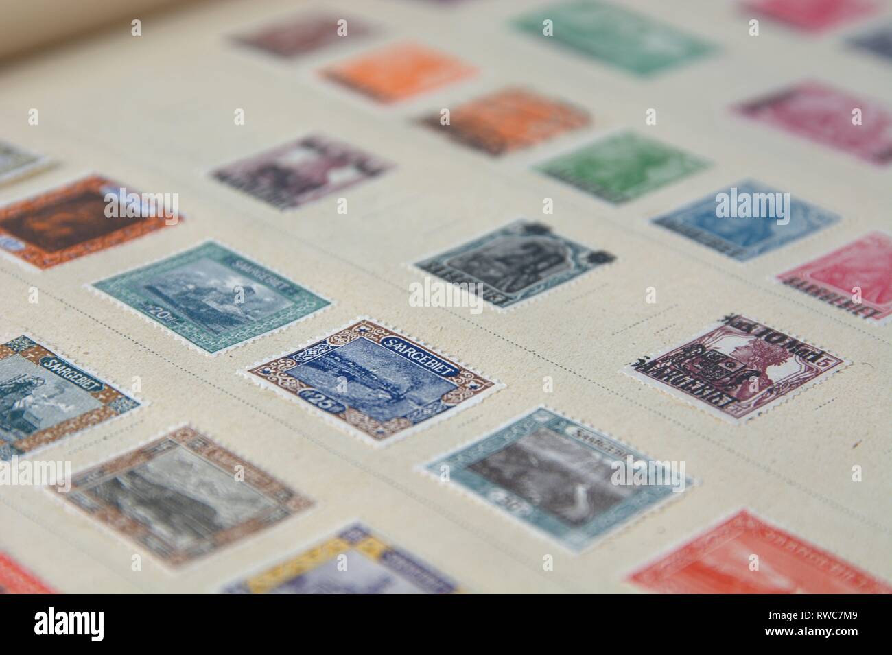 Deutschland. 06th Nov, 2018. An old, illustrated stamp album, Viktoria Permanent Edition by Schaubeks with old, glued stamps. Detail as a symbolic picture on the theme stamp collection, collecting stamps. | usage worldwide Credit: dpa/Alamy Live News Stock Photo