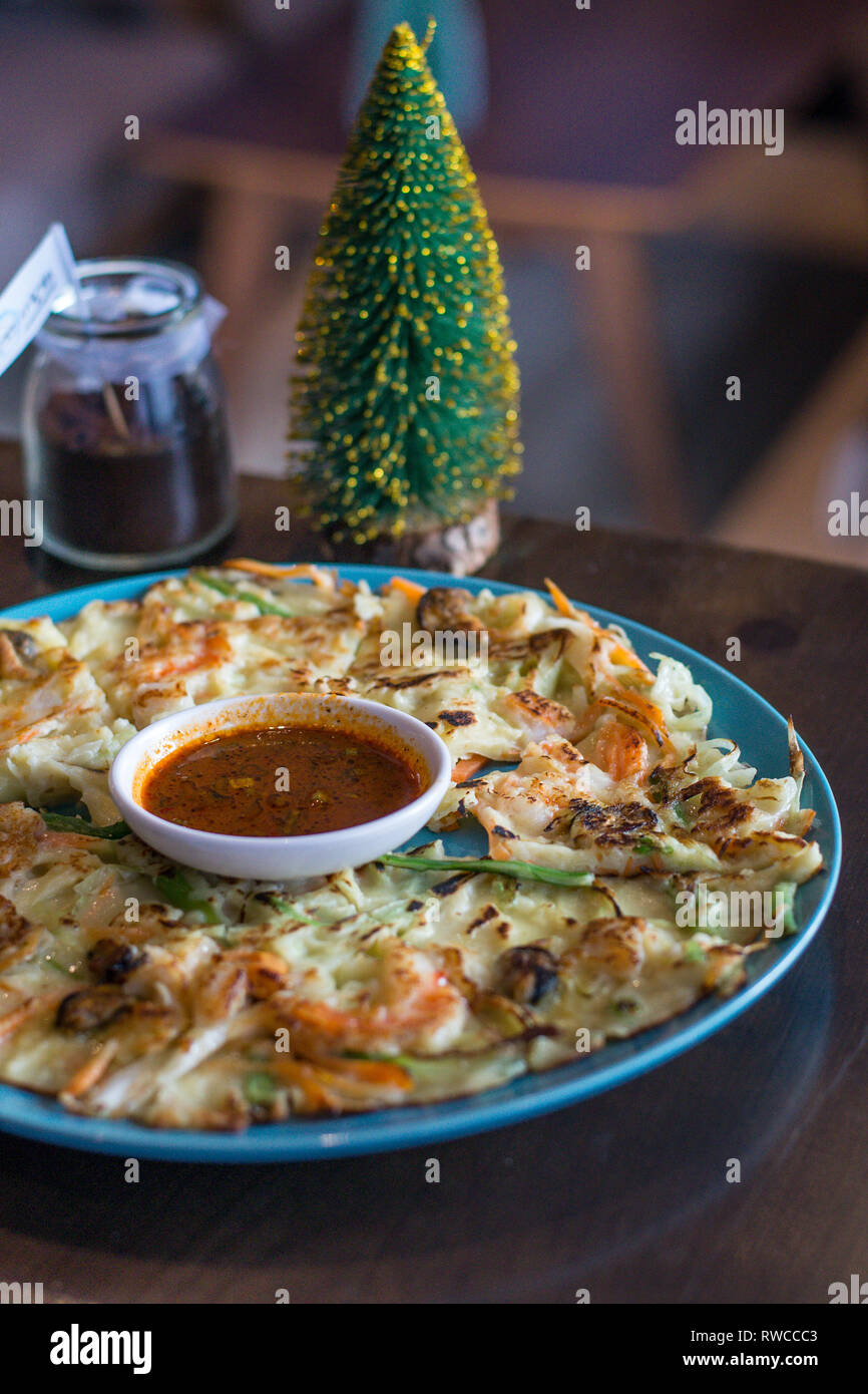 Seafood pancake with shrimp and spring onion and sauce Stock Photo Alamy
