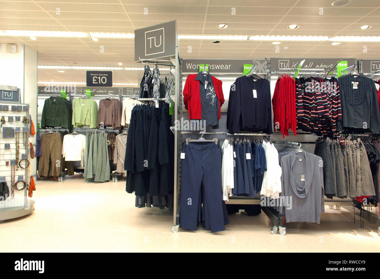 A variety of clothes for sale in Sainsbury womenswear department Stock Photo