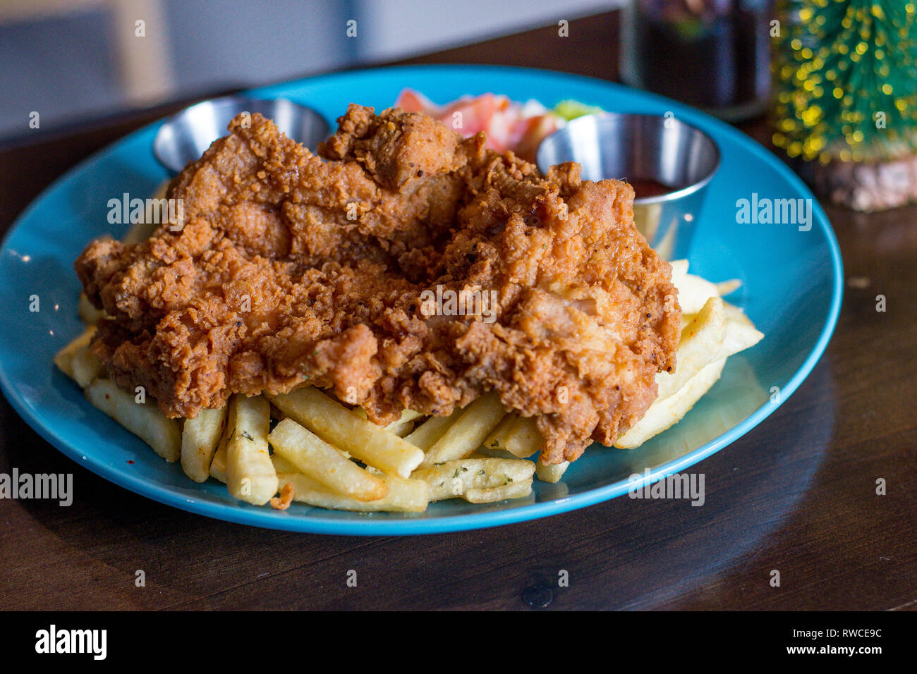 Chicken Chop Garlic Soy Sauce with french fries and coleslaw Stock