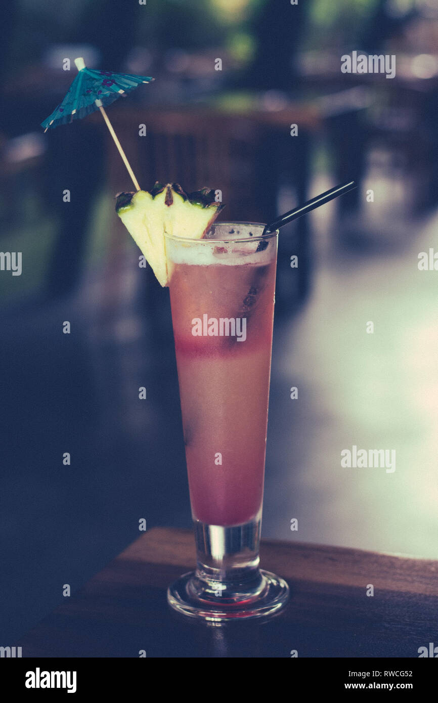 Signature Sling, Gin, Cherry Brandy, Pineapple Juice, Grenadine Syrup