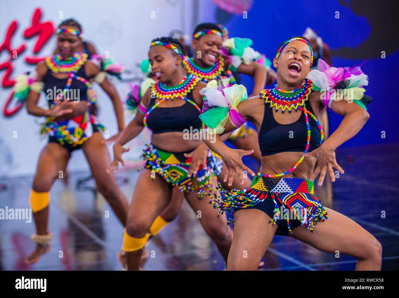 South African dancers from Amazebra Folklore Dance Ensemble perform at the Maskdance festival held in Andong South Korea Stock Photo