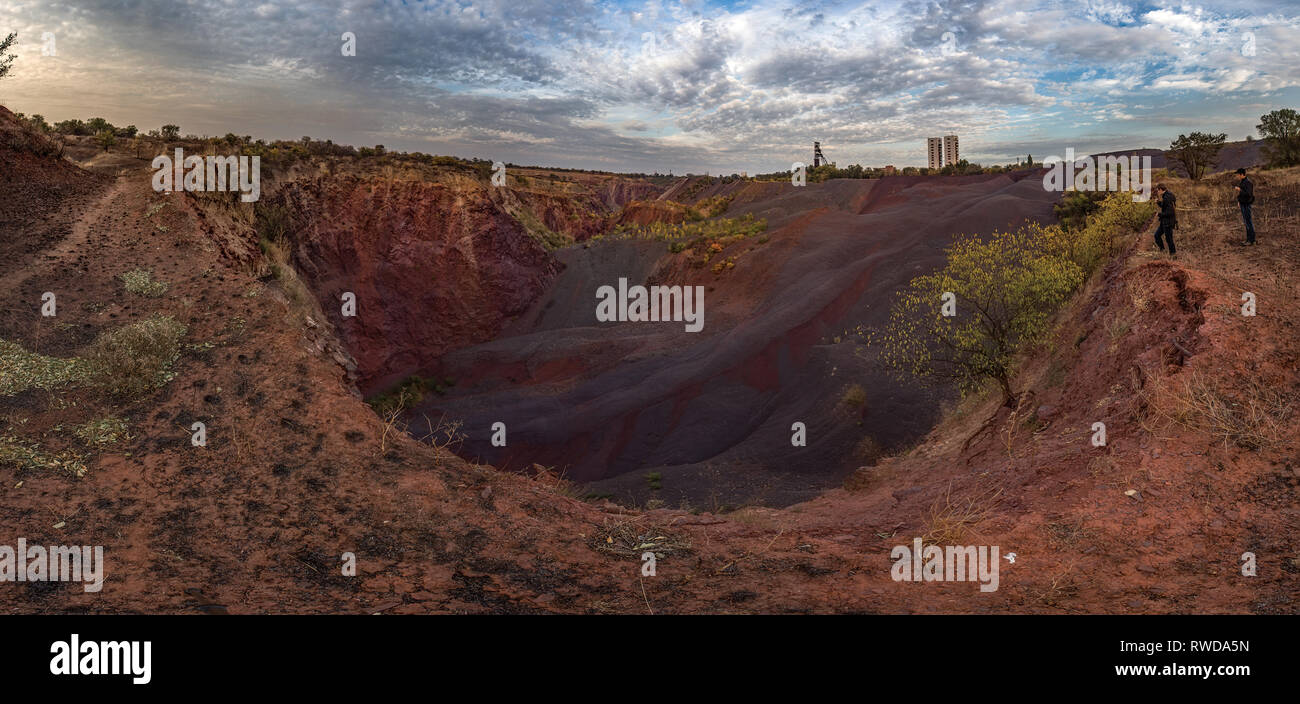 An ground breed collapse. A land collapse on mine background. Ukrainian metallurgy activity. Crumble breed Stock Photo
