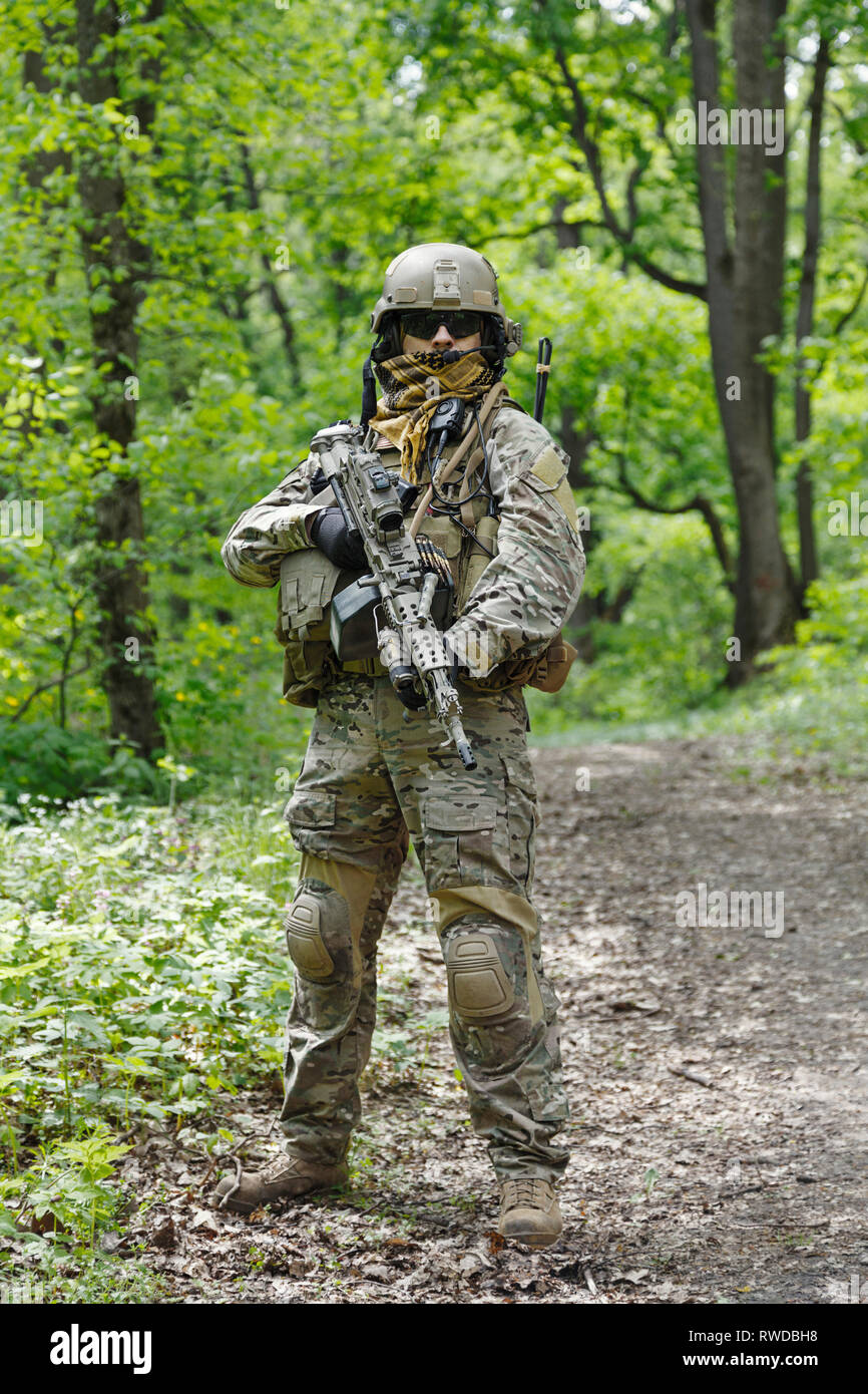 Green Berets U.S. Army Special Forces Group soldier in action. Stock Photo