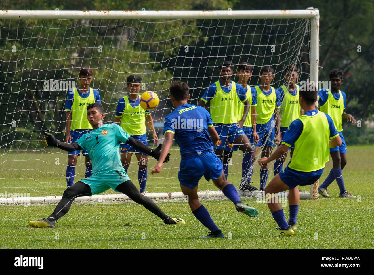 Selangor U-19 football players are seen in action during the training session. Michael Owen the former England international football star has been in Malaysia for a promotional visit and share his tips and experiences with the Selangor U-19 team organised by Cadbury. Stock Photo