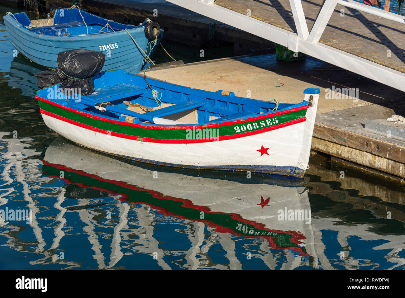 small colorful fishing boat in the port of Setubal, Portugal Stock Photo -  Alamy