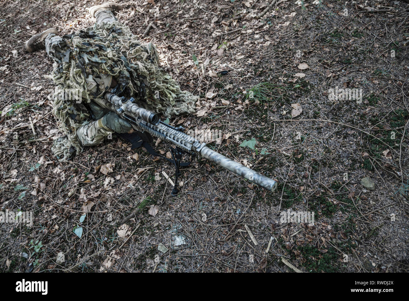 Sniper ghillie suit hi-res stock photography and images - Alamy