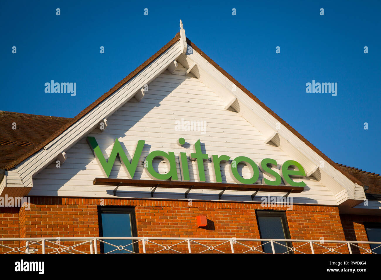 The Waitrose sign on the front of the Waitrose store in Henleyon