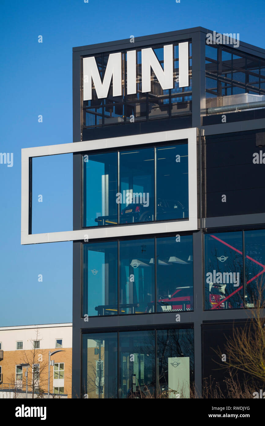 The BMW Mini sign on the showroom and offices of Cooper BMW in Reading, Berkshire. Stock Photo