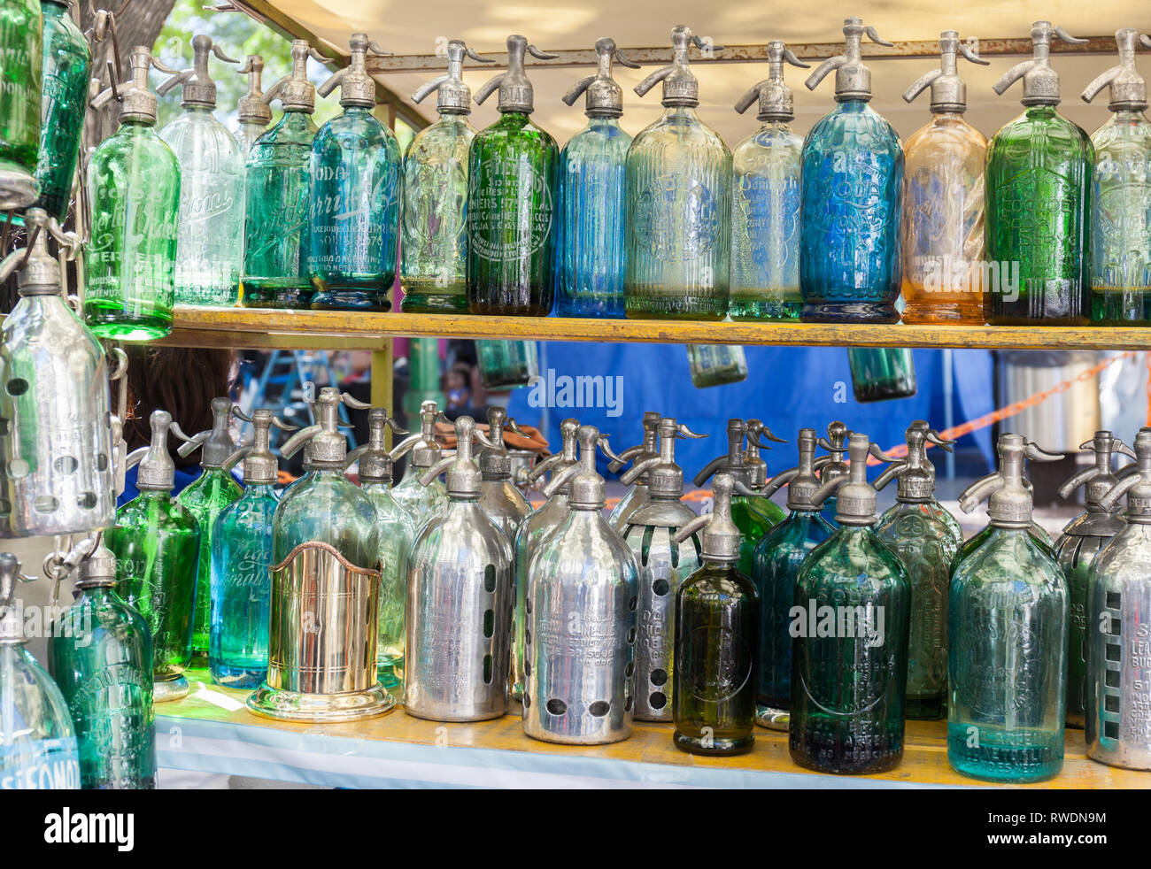 Soda bottles Antique Siphons bottles Glass at San Telmo flea market in Buenos Aires, Argentina. Stock Photo