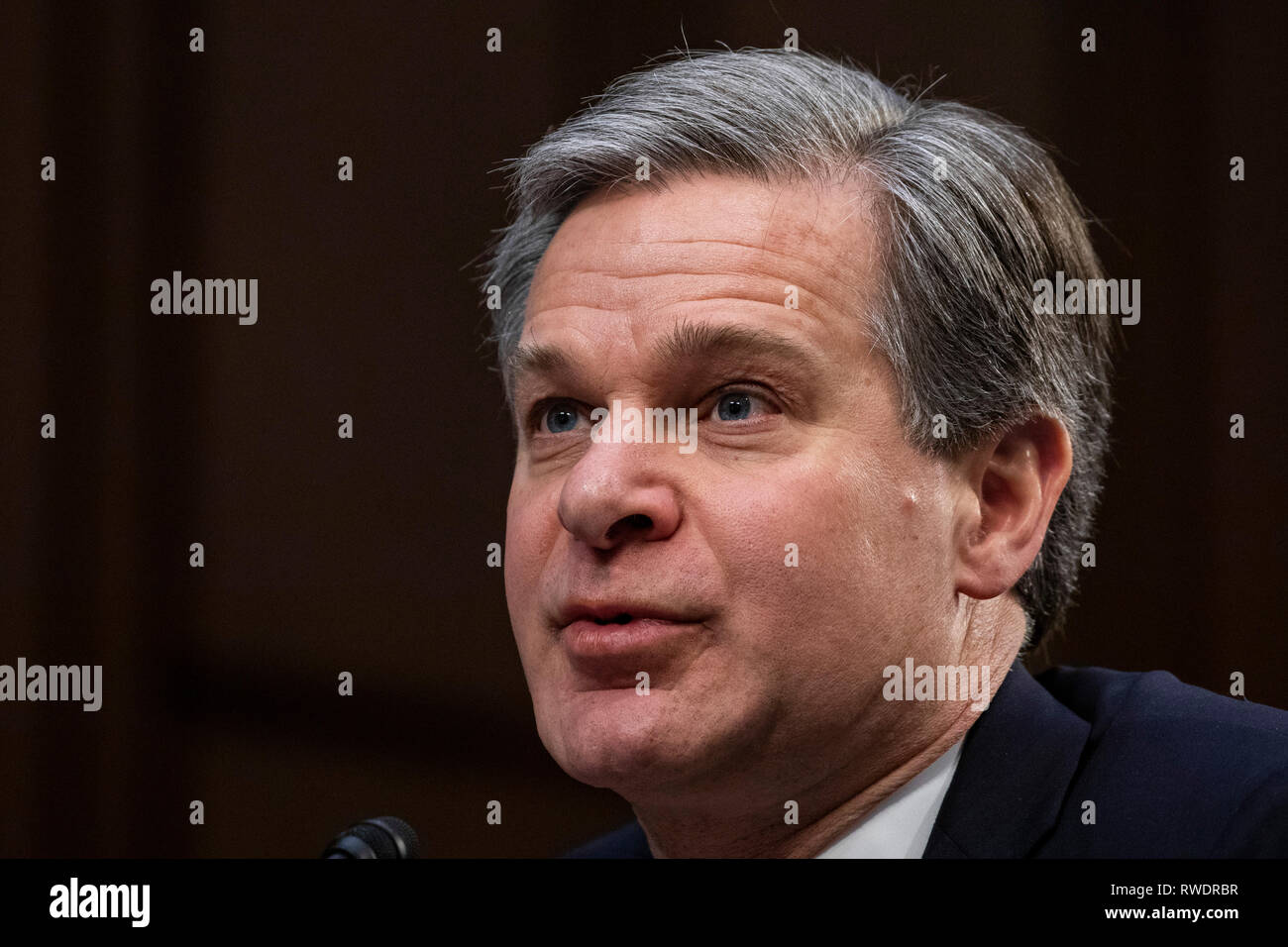 FBI Director Christopher Wray testifies during a Senate Intelligence Committee Hearing on